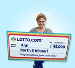Winner Ann holds a check for $45,000 in her hands